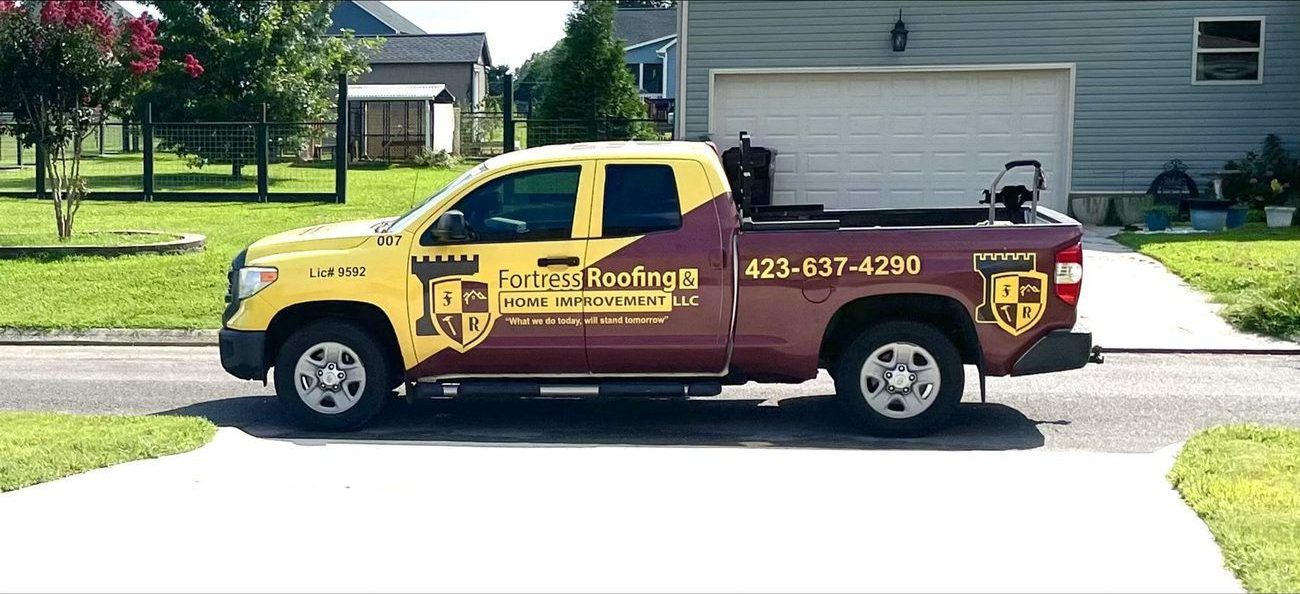 Fortress Roofing & Home Improvement branded truck