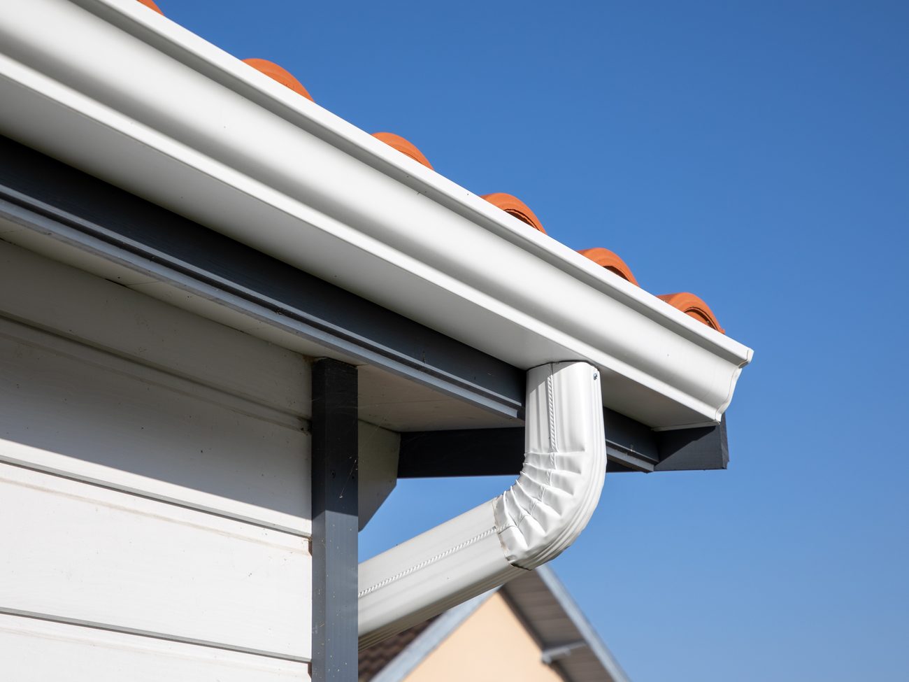 New gutter and downspout installation